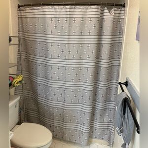 Gray toned shower curtain.